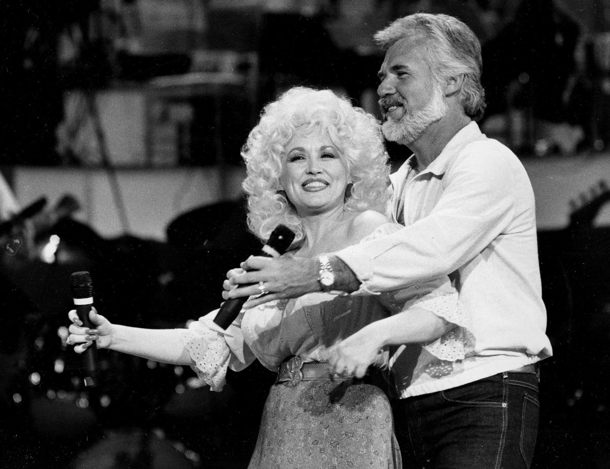 In this Sept. 27, 1983 photo, Country Music singers Dolly Parton and Kenny Rogers rehearse a song for their appearance on the TV show &amp;quot;Live... And in Person&amp;quot; in Los Angeles. Rogers,  ...