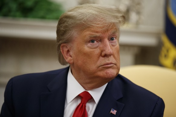 President Donald Trump listens to a reporter&#039;s question during a meeting with Bahrain&#039;s Crown Prince Salman bin Hamad Al Khalifaâ?? in the Oval Office of the White House, Monday, Sept. 16, 2 ...