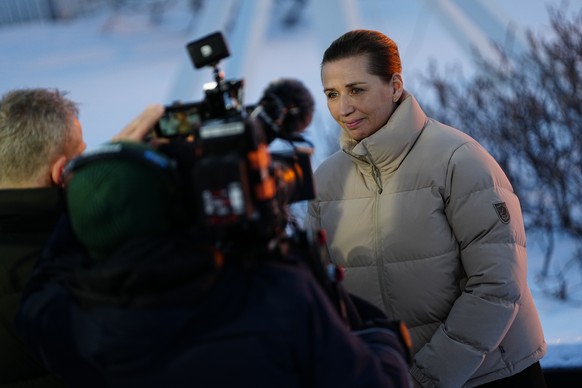 epa12675689 Danish Prime Minister Mette Frederiksen talks to the press during sunset in Nuuk, Greenland, 23 January 2026. EPA/MADS CLAUS RASMUSSEN DENMARK OUT