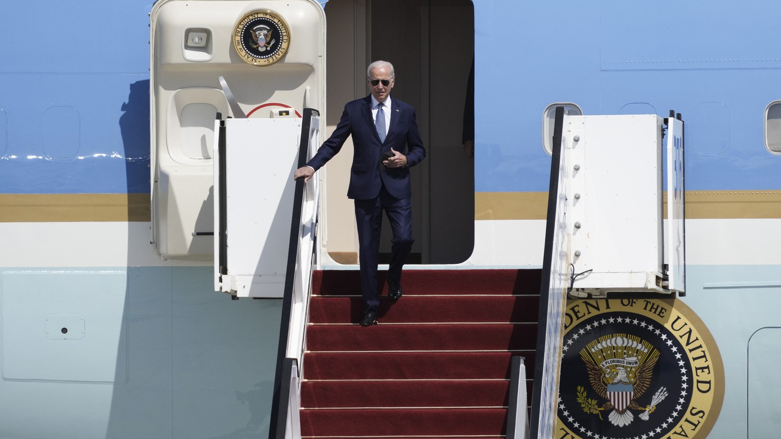 President Joe Biden walk down the steps of Air Force One upon his arrival at Ben Gurion International Airport near Tel Aviv, Israel Wednesday, July 13, 2022. Biden arrives in Israel on Wednesday for a ...