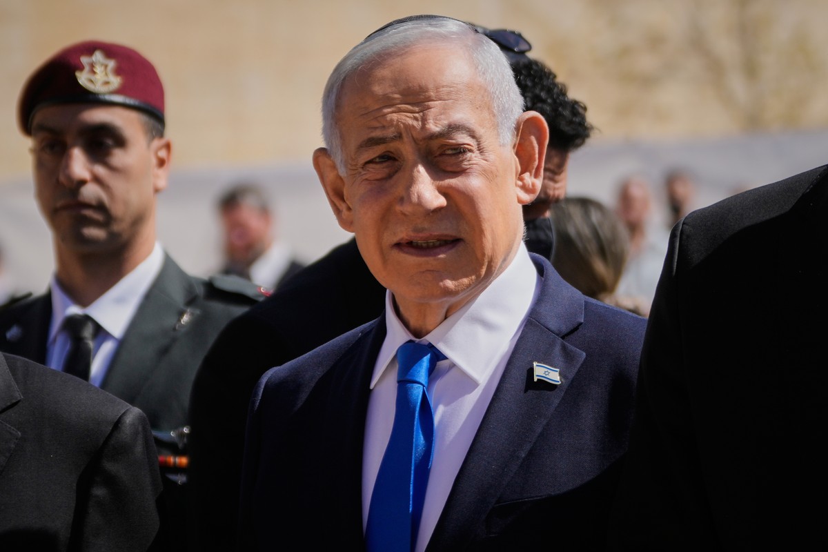 Israeli Prime Minister Benjamin Netanyahu attends a ceremony marking the annual Holocaust Remembrance Day at the Yad Vashem Holocaust Memorial in Jerusalem Tuesday, April 14, 2026. (AP Photo/Ohad Zwig ...
