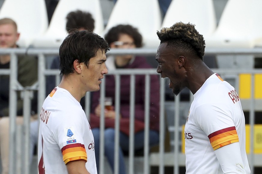 Roma&#039;s Tammy Abraham celebrates with teammate Eldor Shomurodov, left, after scoring his side&#039;s second goal during the Italian Serie A soccer match between Venezia and Roma, at the Penzo stad ...