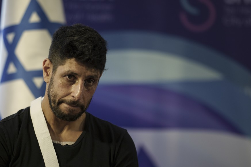 The actor Idan Amedi, well known for his role in the Netflix series &quot;Fauda&quot;, listens to a question during a press conference at the Sheba Medical Center in Ramat Gan, Israel, Thursday, Jan.  ...