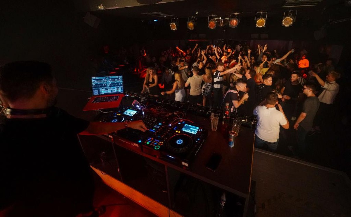 BRIGHTON, ENGLAND - JULY 19: Clubbers take to the dance floor just minutes after Pryzm nightclub threw open its doors to celebrate the relaxing of Covid-19 rules in the early hours of July 19, 2021 in ...