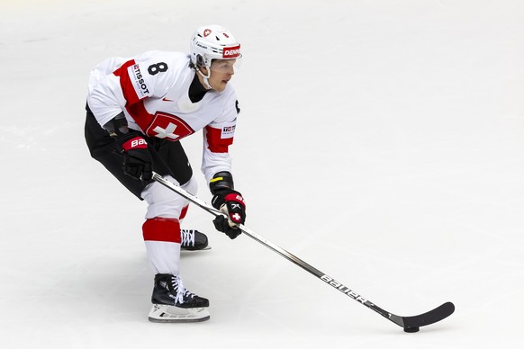 Switzerland&#039;s forward Simon Knak controls the puck, during the IIHF 2025 World Championship preliminary round group B game between Denmark and Switzerland, at the Jyske Bank Boxen, in Herning, De ...