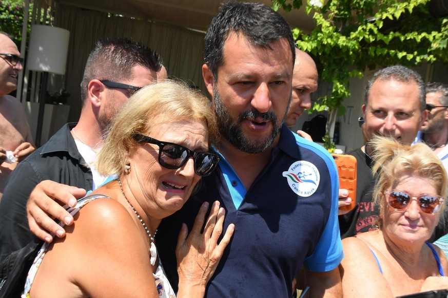 Italian Deputy Prime Minister and Interior Minister, Matteo Salvini embraces an emotional supporter at the end of a political rally as part of his &#039;Italian summer tour&#039;, in Taormina, Souther ...