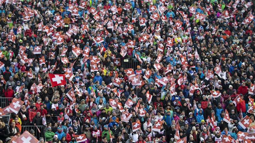 Swiss fans reacts in the finish area during the first run of the men&#039;s giant slalom race at the Alpine Skiing FIS Ski World Cup in Adelboden, Switzerland, Saturday, January 12, 2019. (KEYSTONE/Pe ...