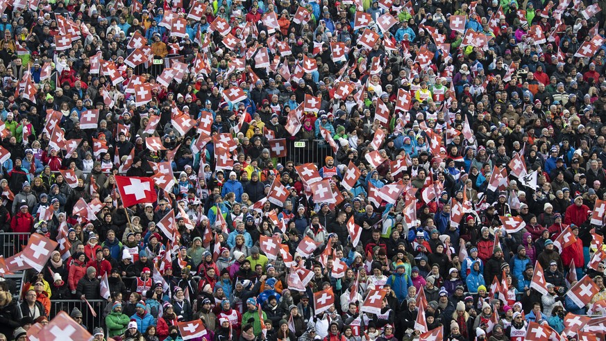 Swiss fans reacts in the finish area during the first run of the men&#039;s giant slalom race at the Alpine Skiing FIS Ski World Cup in Adelboden, Switzerland, Saturday, January 12, 2019. (KEYSTONE/Pe ...