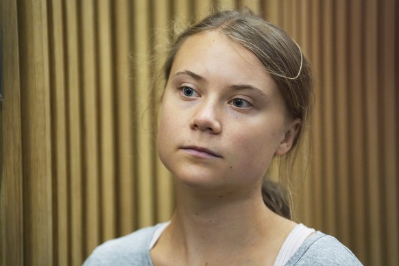 Climate activist Greta Thunberg waits for a hearing in a court in Malmo, Sweden, Monday, July 24, 2023. Thunberg appeared in court on Monday charged with disobeying law enforcement in connection with  ...