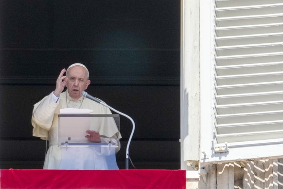 Pope Francis delivers his blessing as he recites the Angelus noon prayer from the window of his studio overlooking St.Peter&#039;s Square, at the Vatican, Sunday, Sept. 5, 2021. Francis is encouraging ...