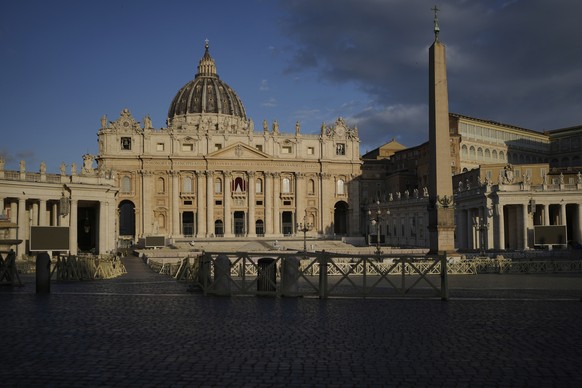 The morning sun shines on the St. Peter&#039;s Basilica with the Sistine Chapel at background right, where the cardinals elect a new pope during the conclave at the Vatican, Thursday, May 8, 2025. (AP ...