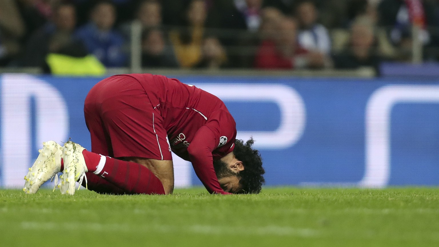 Liverpool&#039;s Mohamed Salah celebrates after scoring his side&#039;s second goal during the Champions League quarterfinals, 2nd leg, soccer match between FC Porto and Liverpool at the Dragao stadiu ...