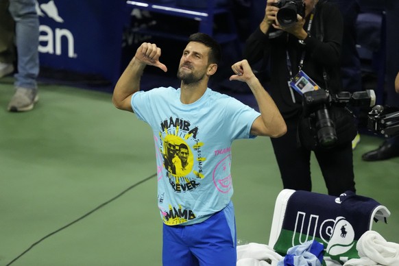 Novak Djokovic, of Serbia, reacts after defeating Daniil Medvedev, of Russia, in the men&#039;s singles final of the U.S. Open tennis championships, Sunday, Sept. 10, 2023, in New York. (AP Photo/Mary ...
