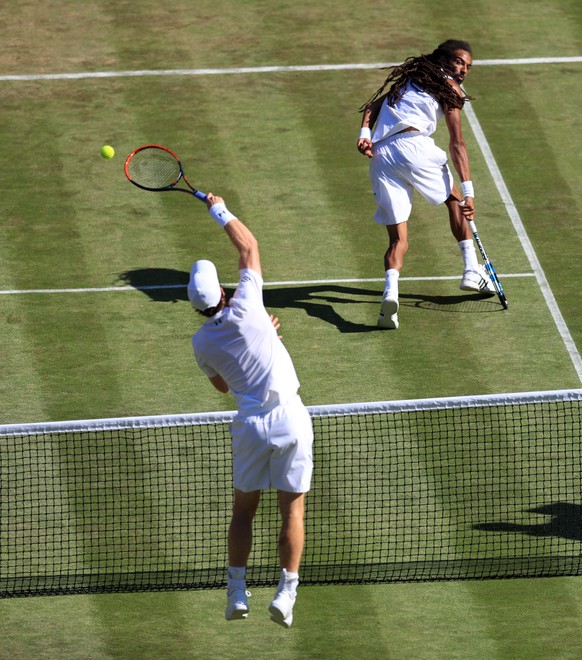 epa06068055 Andy Murray of Britain returns to Dustin Brown of Germany in their second round match during the Wimbledon Championships at the All England Lawn Tennis Club, in London, Britain, 05 July 20 ...