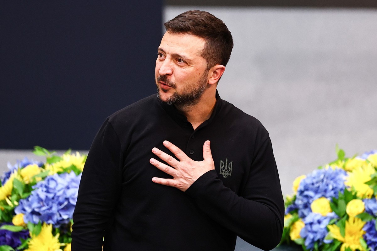 epa11403865 Ukrainian President Volodymyr Zelensky reacts after delivering a speech in the German Parliament 'Bundestag' in Berlin, Germany, 11 June 2024. The Ukrainian president attends the ...