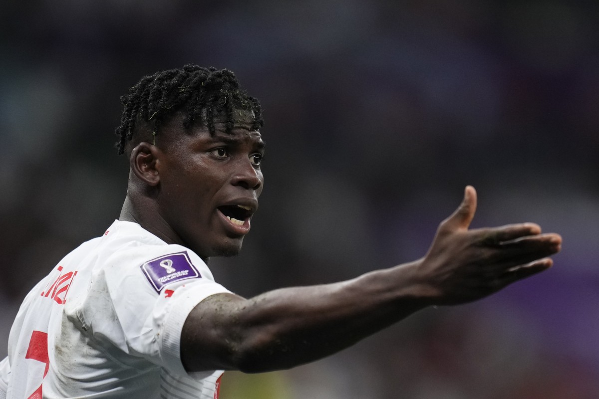 Switzerland's Breel Embolo reacts during the World Cup round of 16 soccer match between Portugal and Switzerland, at the Lusail Stadium in Lusail, Qatar, Tuesday, Dec. 6, 2022. (AP Photo/Manu Fer ...