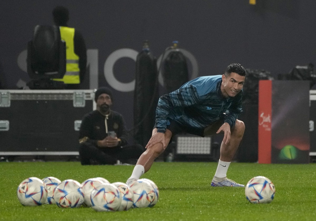FILE - Cristiano Ronaldo, warms up during his first training after the official unveiling as a new member of Al Nassr soccer club in in Riyadh, Saudi Arabia, on Jan. 3, 2023. Ronaldo is not the first  ...