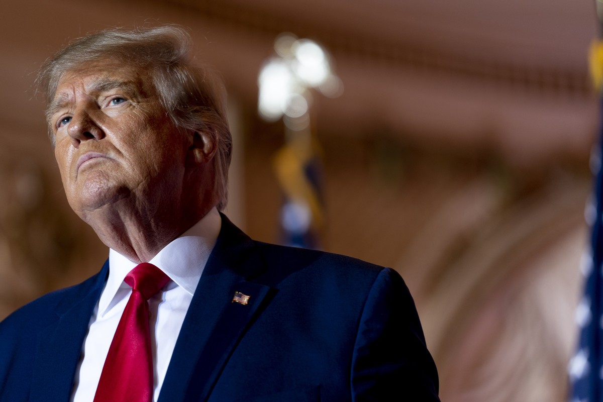 FILE - Former President Donald Trump announces he is running for president for the third time as he pauses while speaking at Mar-a-Lago in Palm Beach, Fla., Nov. 15, 2022. Attorney General Merrick Gar ...