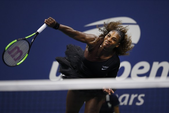 Serena Williams, of the United States, serves to Karolina Pliskova, of the Czech Republic, during the quarterfinals of the U.S. Open tennis tournament, Tuesday, Sept. 4, 2018, in New York. (AP Photo/J ...