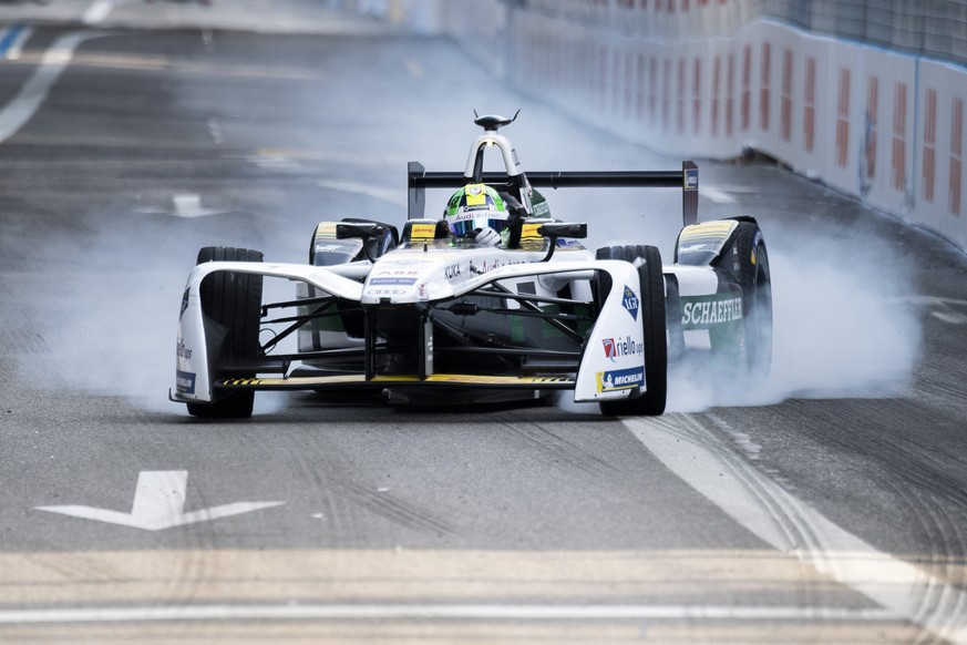 Brazilian driver Lucas Di Grassi, Audi sport ABT Schaeffler, celebrates after winning the Zurich E-Prix, the tenth stage of the ABB FIA Formula E championship, in Zurich, Switzerland, Sunday, June 10, ...