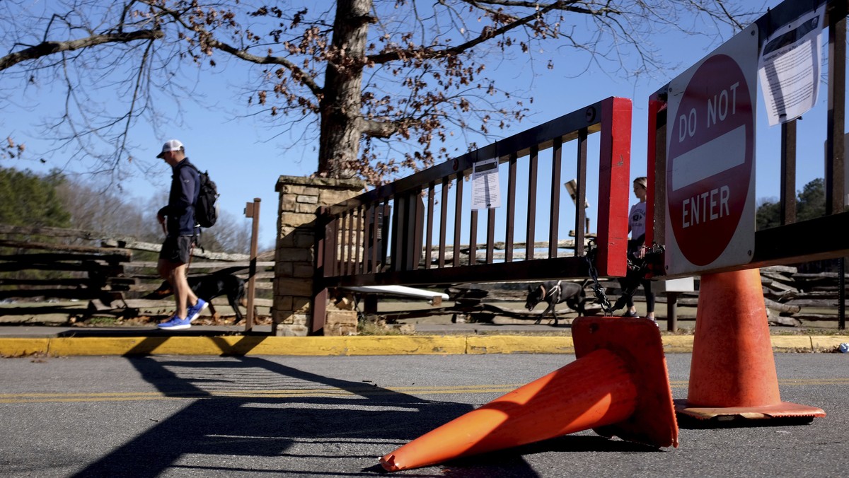The gates to the Kennesaw Mountain National Battlefield Park visitor center are locked as part of the government shutdown in Kennesaw, Ga., Sunday, Jan. 21, 2018. President Donald Trump's budget  ...