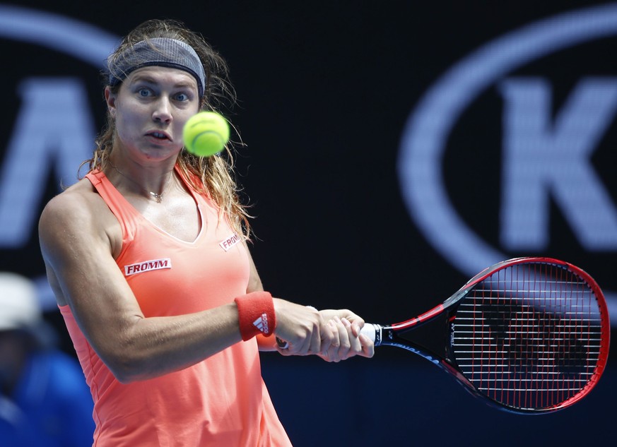 epa05725894 Stefanie Voegele of Switzerland in action against Venus Williams of the USA during round two of the Women&#039;s Singles at the Australian Open Grand Slam tennis tournament in Melbourne, V ...