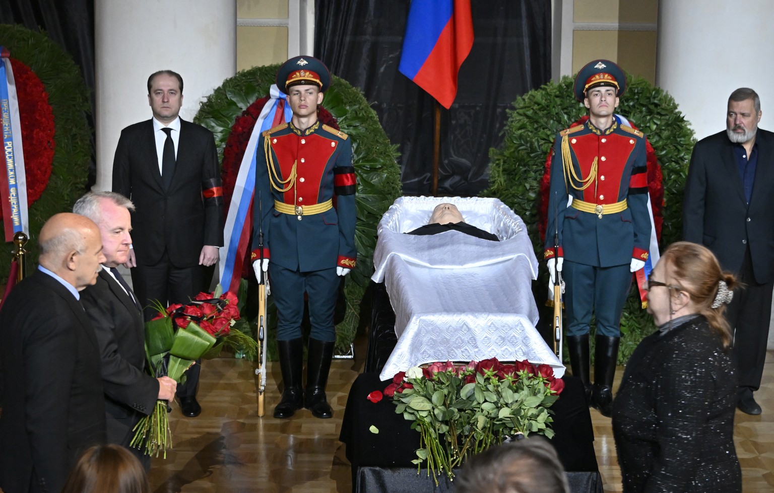 US ambassador to Russia John Joseph Sullivan, second left, walks to the coffin of former Soviet President Mikhail Gorbachev inside the Pillar Hall of the House of the Unions during a farewell ceremony ...