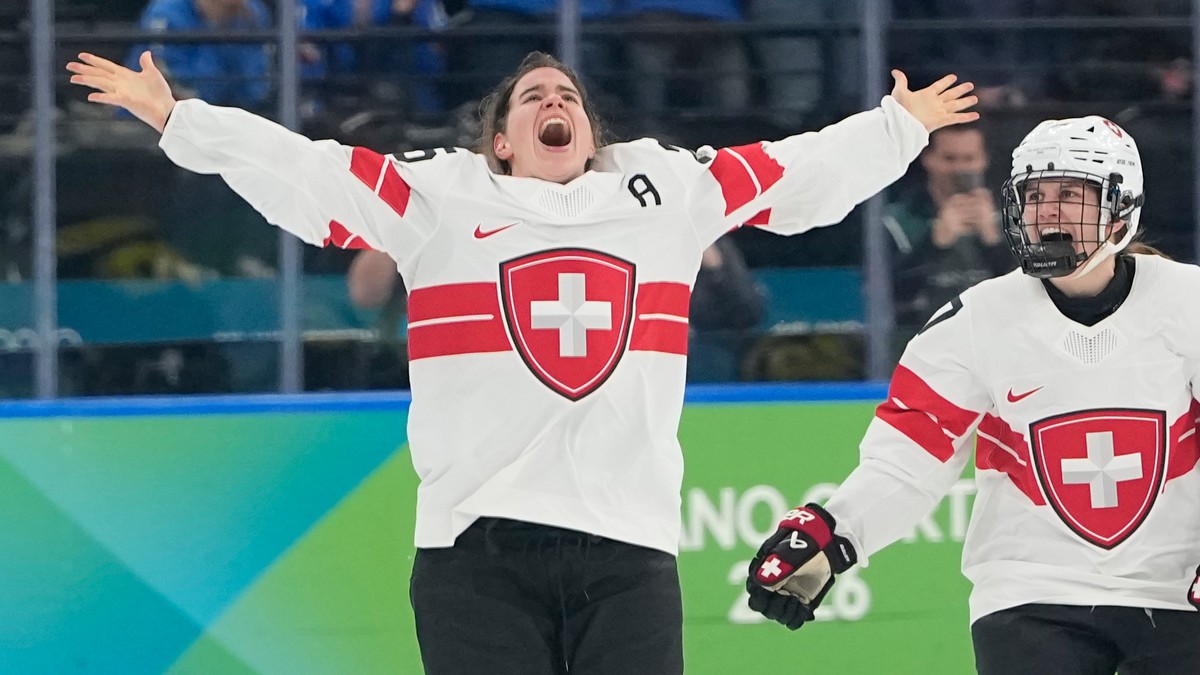 Switzerland's Alina Muller (25) celebrates after a women's ice hockey bronze medal game between Switzerland and Sweden at the 2026 Winter Olympics, in Milan, Italy, Thursday, Feb. 19, 2026.  ...
