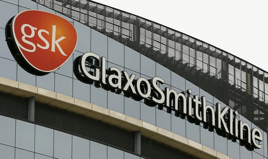 FILE - This April 28, 2010 file photo shows British drugmaker GlaxoSmithKline&#039;s headquarters in London. Hundreds of GlaxoSmithKline&#039;s 17,000 U.S.-based employees will lose their jobs by the  ...