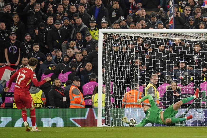 PSG&#039;s goalkeeper Gianluigi Donnarumma saves a penalty from Liverpool&#039;s Curtis Jones during a shootout at the end of the Champions League round of 16 second leg soccer match between Liverpool ...