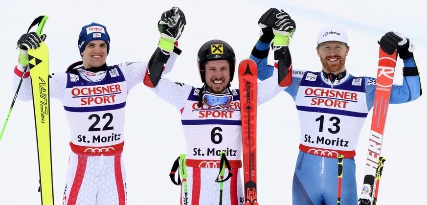 From left, silver medalist Austria&#039;s Roland Leitinger, gold medalist Austria&#039;s Marcel Hirscher and bronze medalist Norway&#039;s Leif Kristian Haugen celebrate in the finish area after the m ...