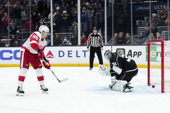 Detroit Red Wings right wing Patrick Kane (88) scores against Los Angeles Kings goaltender David Rittich during the shootout in an NHL hockey game Thursday, Jan. 4, 2024, in Los Angeles. The Red Wings ...