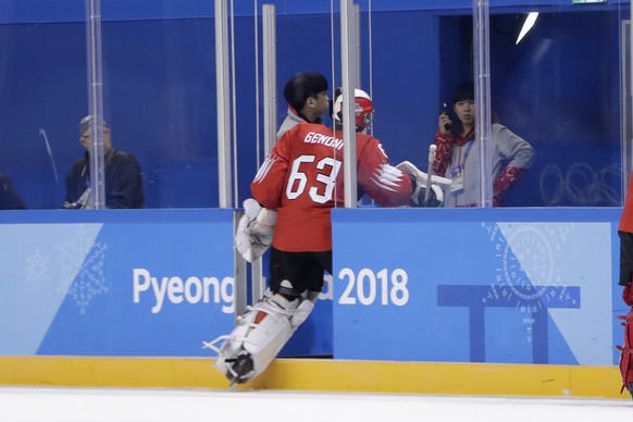 Switzerland goalkeeper Leonardo Genoni leaves the ice after allowing four goals to Canada during the second period of a preliminary round men&#039;s hockey game at the 2018 Winter Olympics in Gangneun ...