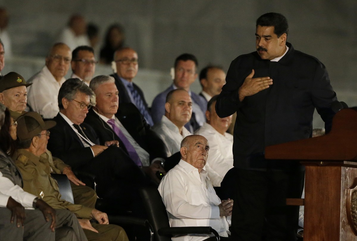 Venezuela's President, right, speaks during a rally honoring Fidel Castro at the Revolution Plaza in Havana, Cuba, Tuesday, Nov. 29, 2016. Regional leaders and tens of thousands of Cubans filled  ...