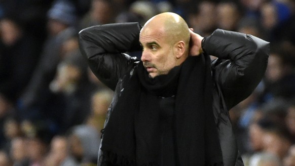 Manchester City&#039;s head coach Pep Guardiola reacts during the English Premier League soccer match between Manchester City and Manchester United at Etihad stadium in Manchester, England, Saturday,  ...