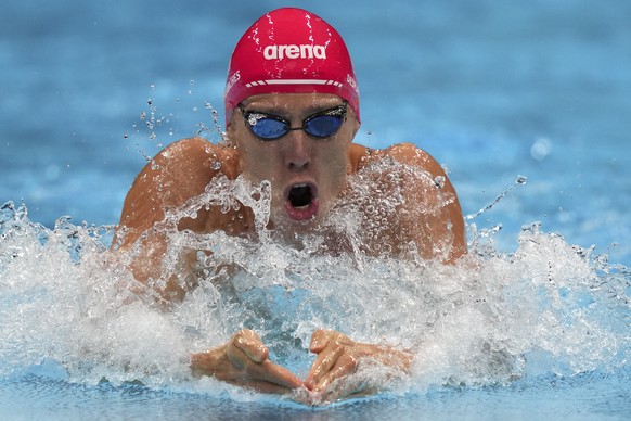 Jeremy Desplanches, of Switzerland, swims in his heat in the men&#039;s 100m breaststroke at the 2020 Summer Olympics, Saturday, July 24, 2021, in Tokyo, Japan. (AP Photo/Matthias Schrader)
Jeremy Des ...