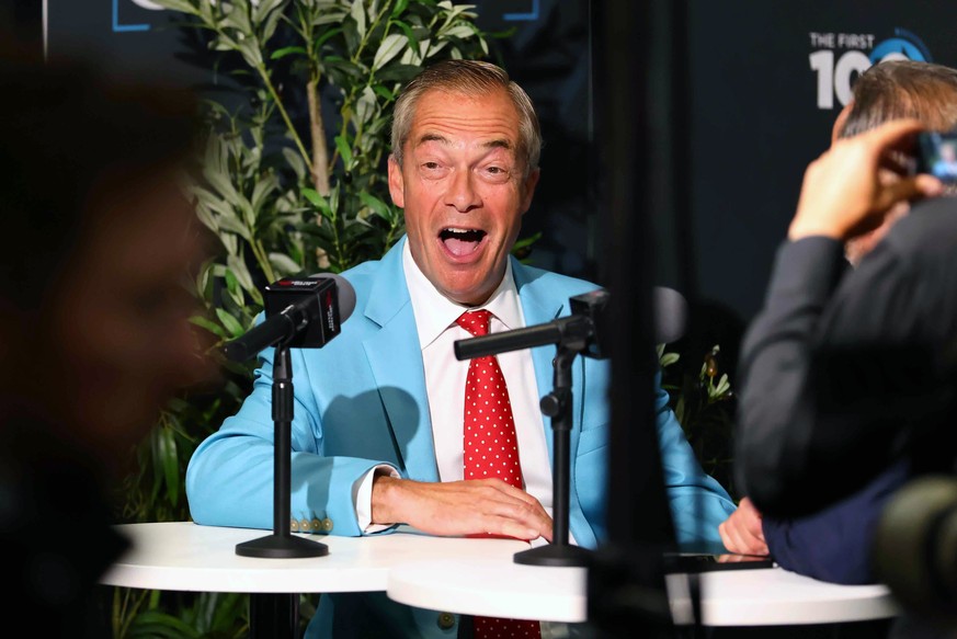 KEYPIX - epa13213741 Reform UK leader Nigel Farage reacts as he gives a media interview on the third day of the Reform UK Annual Conference at the National Exhibition Centre (NEC) in Birmingham, Brita ...