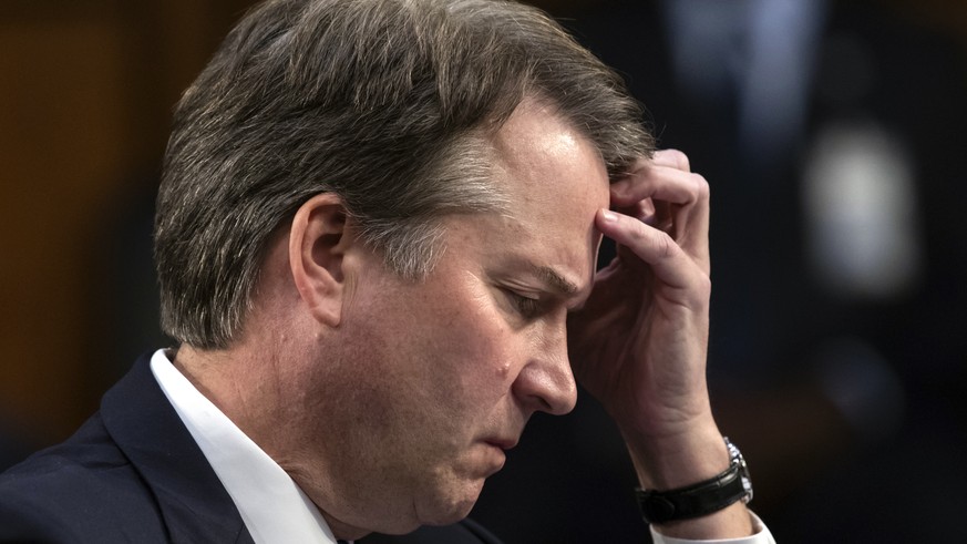 In this Sept. 6, 2018 photo, Supreme Court nominee, Brett Kavanaugh waits to testify before the Senate Judiciary Committee for the third day of his confirmation hearing, on Capitol Hill in Washington. ...