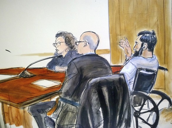 In this courtroom drawing, defendant Sayfullo Saipov, right, addresses the court during his arraignment on federal terrorism charges, Wednesday, Nov. 1, 2017, at Manhattan Federal Court in New York. T ...