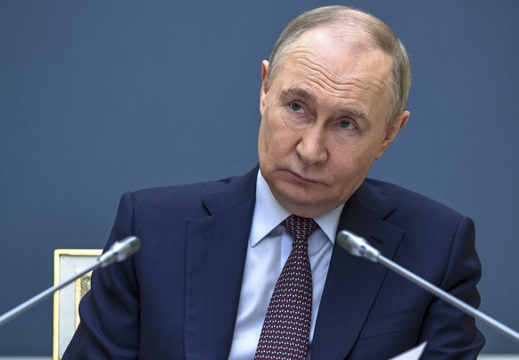 Russian President Vladimir Putin attends a meeting of the All-Russian public organisation &quot;Business Russia&quot;, via videoconference at the Kremlin in Moscow, Russia, Tuesday, May 13, 2025. (Ale ...