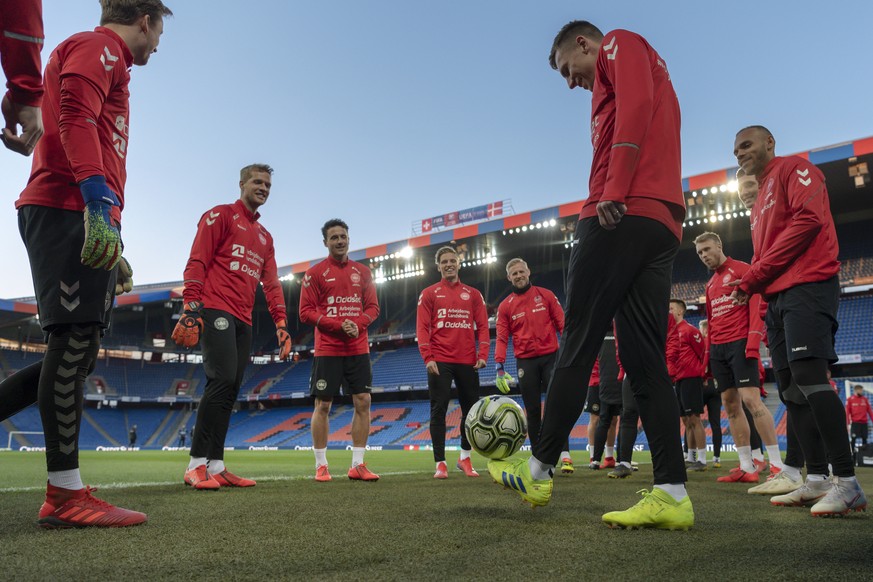 epa07462973 Players of Denmark attend a training session in Basel, Switzerland, 25 March 2019. Denmark will face Switzerland in their UEFA EURO 2020 qualifying Group D soccer match on 26 March 2019. E ...