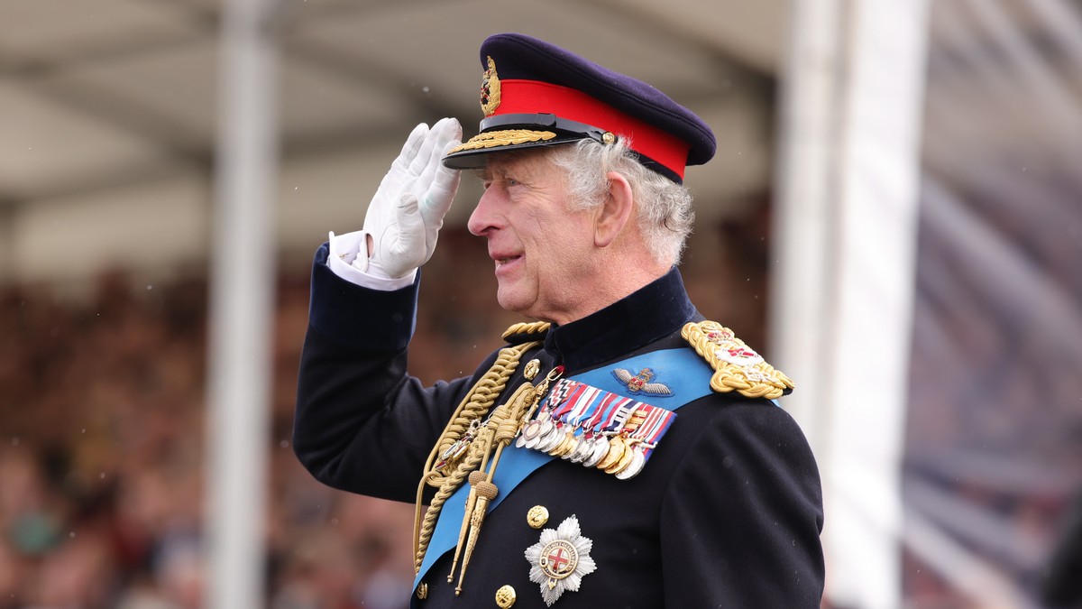 epa10572354 A handout picture provided by the British Ministry of Defence (MoD) shows his Majesty, King Charles III, saluting to staff and cadets at the Royal Military Academy in Sandhurst, Britain, 1 ...
