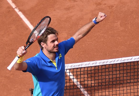 epa06012159 Stanislas Wawrinka of Switzerland reacts after winning against Gael Monfils of France during their men’s singles 4th round match during the French Open tennis tournament at Roland Garros i ...