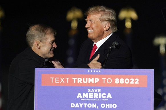 Former President Donald Trump welcomes Rep. Jim Jordan, R-Ohio, to the stage at a campaign rally in support of the campaign of Ohio Senate candidate JD Vance at Wright Bros. Aero Inc. at Dayton Intern ...