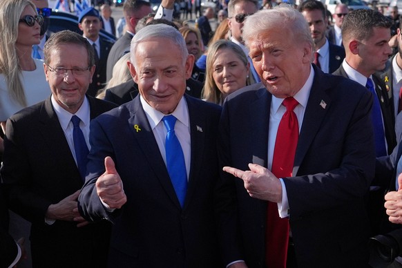 FILE - President Donald Trump poses for a photo with Israel's Prime Minister Benjamin Netanyahu before he boards Air Force One at Ben Gurion International Airport, Oct. 13, 2025, near Tel Aviv, a ...
