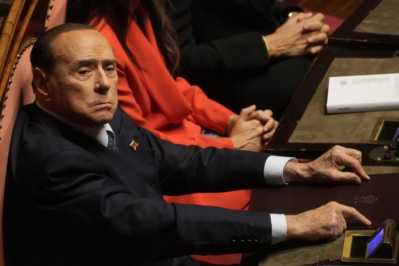 FILE - Forza Italia&#039;s president Silvio Berlusconi takes his seat in the Italian Senate on the opening session of the new parliament, Thursday, Oct. 13, 2022. Doctors for Italian former Premier Si ...