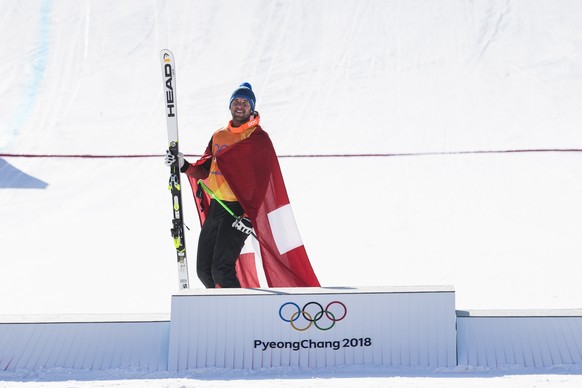 Silver medalist Marc Bischofberger of Switzerland arrives for the podium after the Men Freestyle Skiing Ski Cross X final in the Phoenix Snow Park during the XXIII Winter Olympics 2018 in Pyeongchang, ...