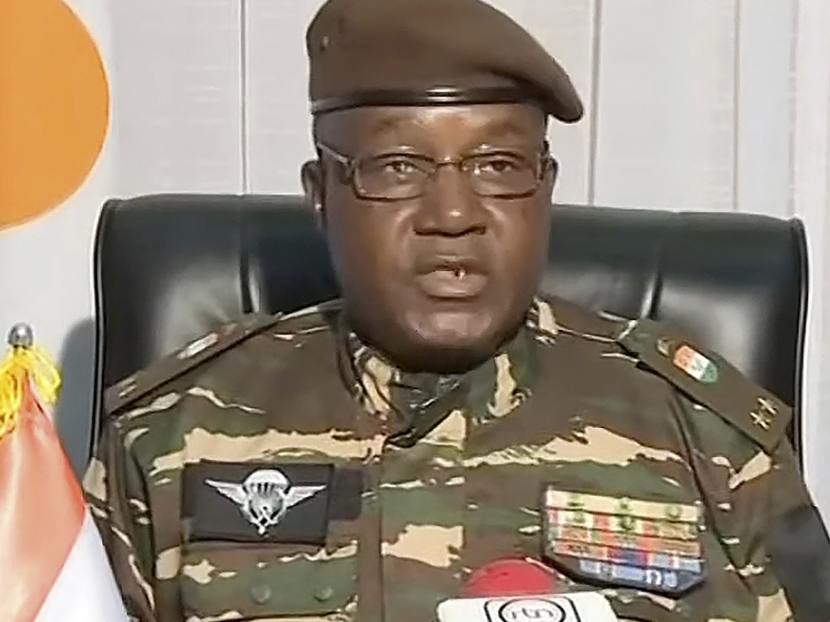 In this image taken from video provided by ORTN, Gen. Abdourahmane Tchiani makes a statement Friday, July 28, 2023, in Niamey, Niger. Niger state television identified him as the leader of the Nationa ...