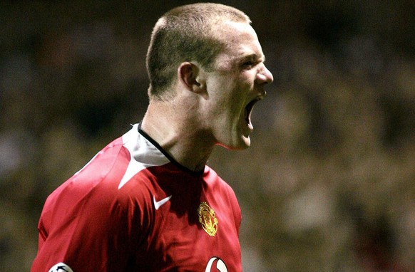 Manchester United debutant Wayne Rooney celebrates his hat-trick against Fenerbahce during their UEFA Champions League Group D match at Old Trafford, Manchester, Tuesday, September 28, 2004. United we ...
