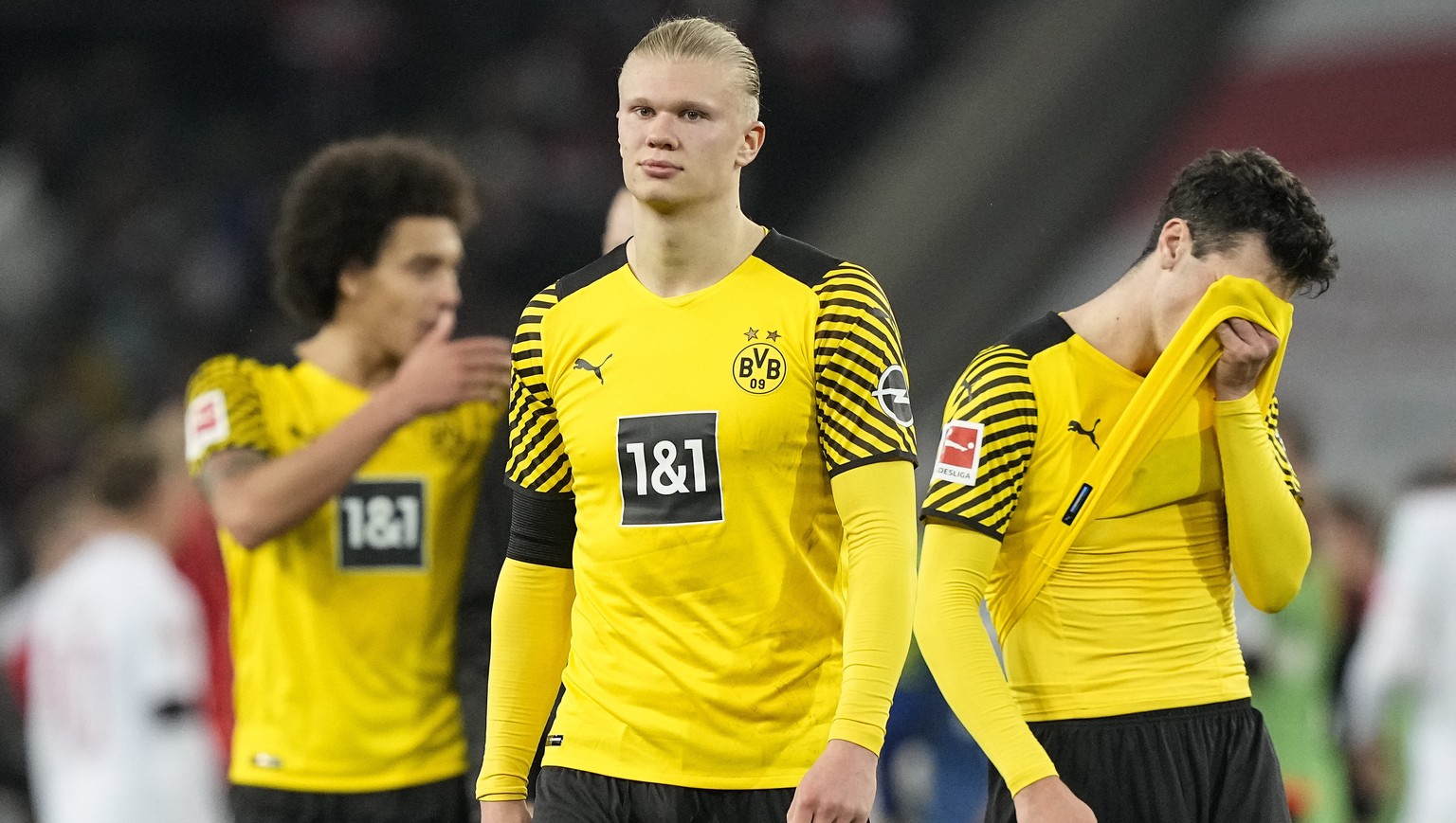 Dortmund&#039;s Erling Haaland, center, and Dortmund&#039;s Giovanni Reyna, right, react disappointed after the German Bundesliga soccer match between 1.FC Cologne and Borussia Dortmund in Cologne, Ge ...